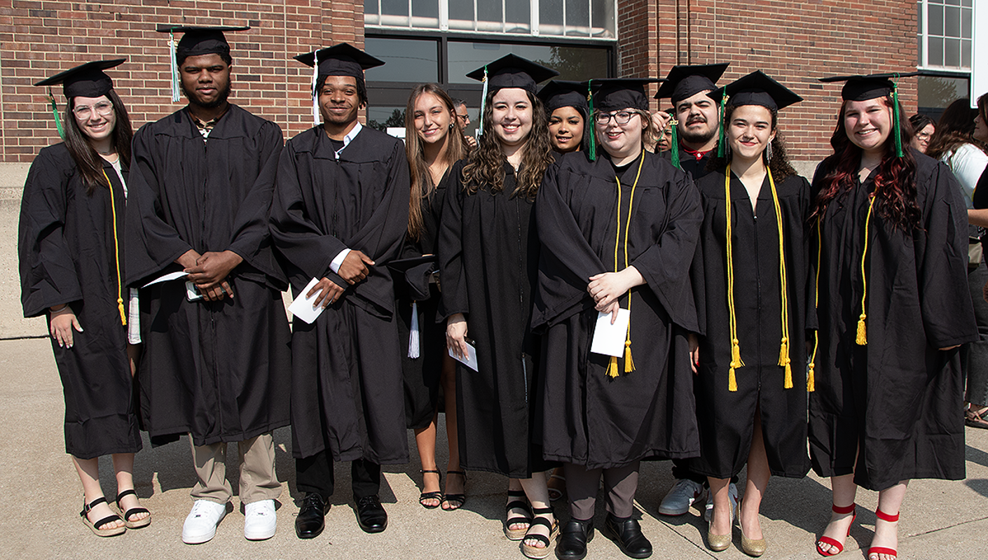 A group of graduates smiling