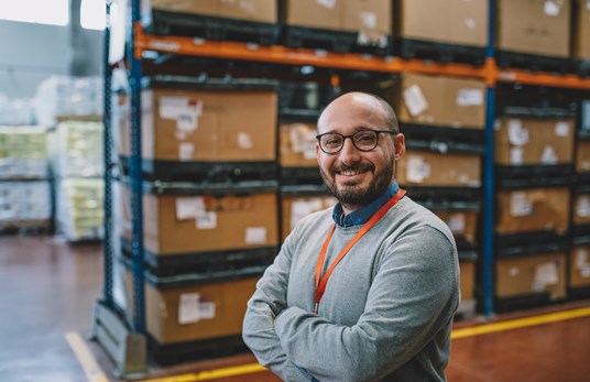 Man standing in supply chain area